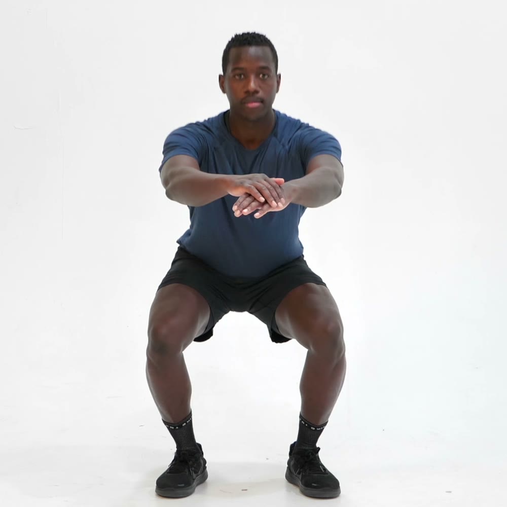 A person mid squat